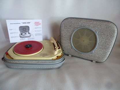 Teppaz Oscar tube record player in grey mottled suitcase